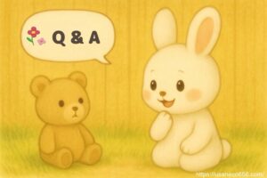 こまちちゃんがうさぎのぬいぐるみと向かい合い、吹き出しで「ほんとにおいしいの?」「あまさがひきたつよ♪」と会話している。木の壁を背景にした、やさしい水彩イラスト。